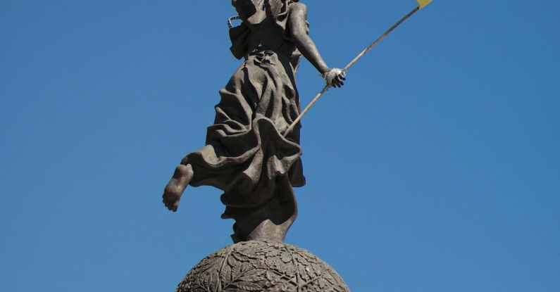 Angel Investors - Ukrainian flag in hand of Nika in Kharkiv